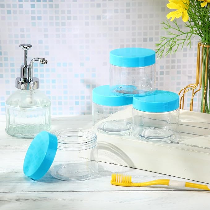SATINIOR 24 Pieces Empty Clear Plastic Jars with Lids Round Storage Containers Wide Mouth for Beauty Product Cosmetic Cream Lotion Liquid Butter Craft and Food(Blue Lid,2 oz)
