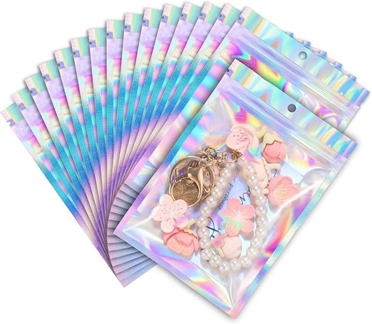 ANZNKU 100 Pack Mylar Bags Reasealable Holographic Bags, Smell Proof Bag Zipper Pouches with Clear Window, Jewelry Candy Sealable Bag for Packaging Sample Party Favor (3 x 4.7 Inch)
