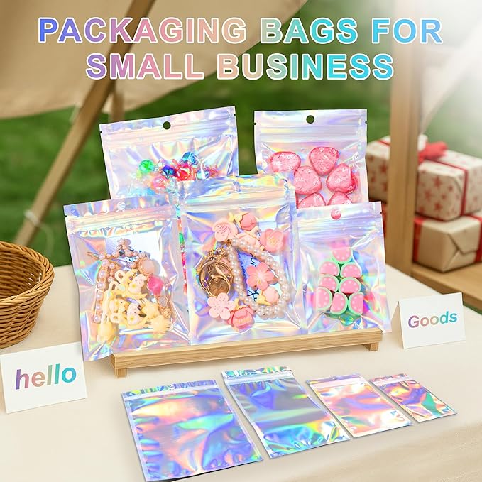 ANZNKU 100 Pack Mylar Bags Reasealable Holographic Bags, Smell Proof Bag Zipper Pouches with Clear Window, Jewelry Candy Sealable Bag for Packaging Sample Party Favor (3 x 4.7 Inch)